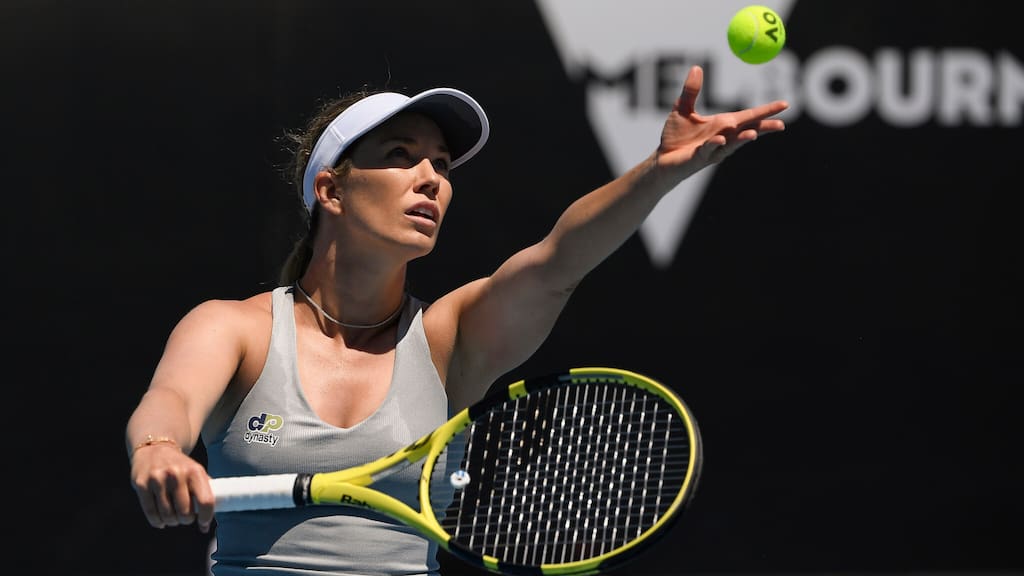 Danielle Collins serving the ball during a tennis match.