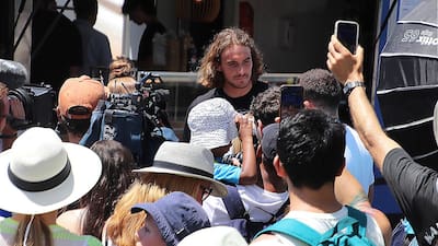 Stefanos Tsitsipas surrounded by fans